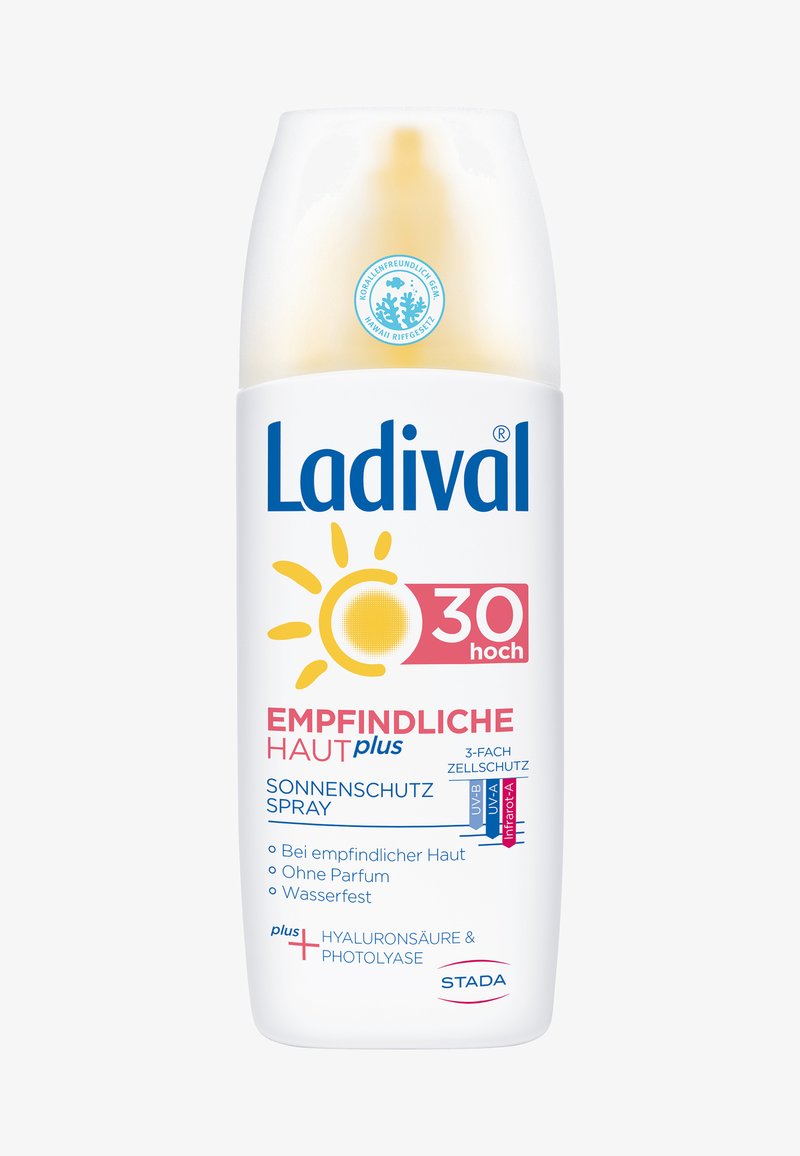 Sonnenschutzspray-Flasche mit weißem Körper, gelbem Deckel und blauer Schrift. Enthält Sonnenbilder, ein SPF 30 Etikett und eine korallenfreundliche Zertifizierung.