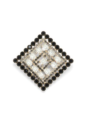 Kvadratisk broche med klare og sorte rhinsten i et geometrisk mønster, sat i guldfarvet metal med et indviklet design.