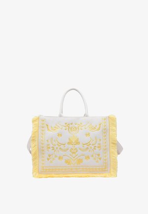 Borsa rettangolare bianca con ricamo floreale giallo e bordi con frange gialle, con due manici corti e chiusura con cerniera.