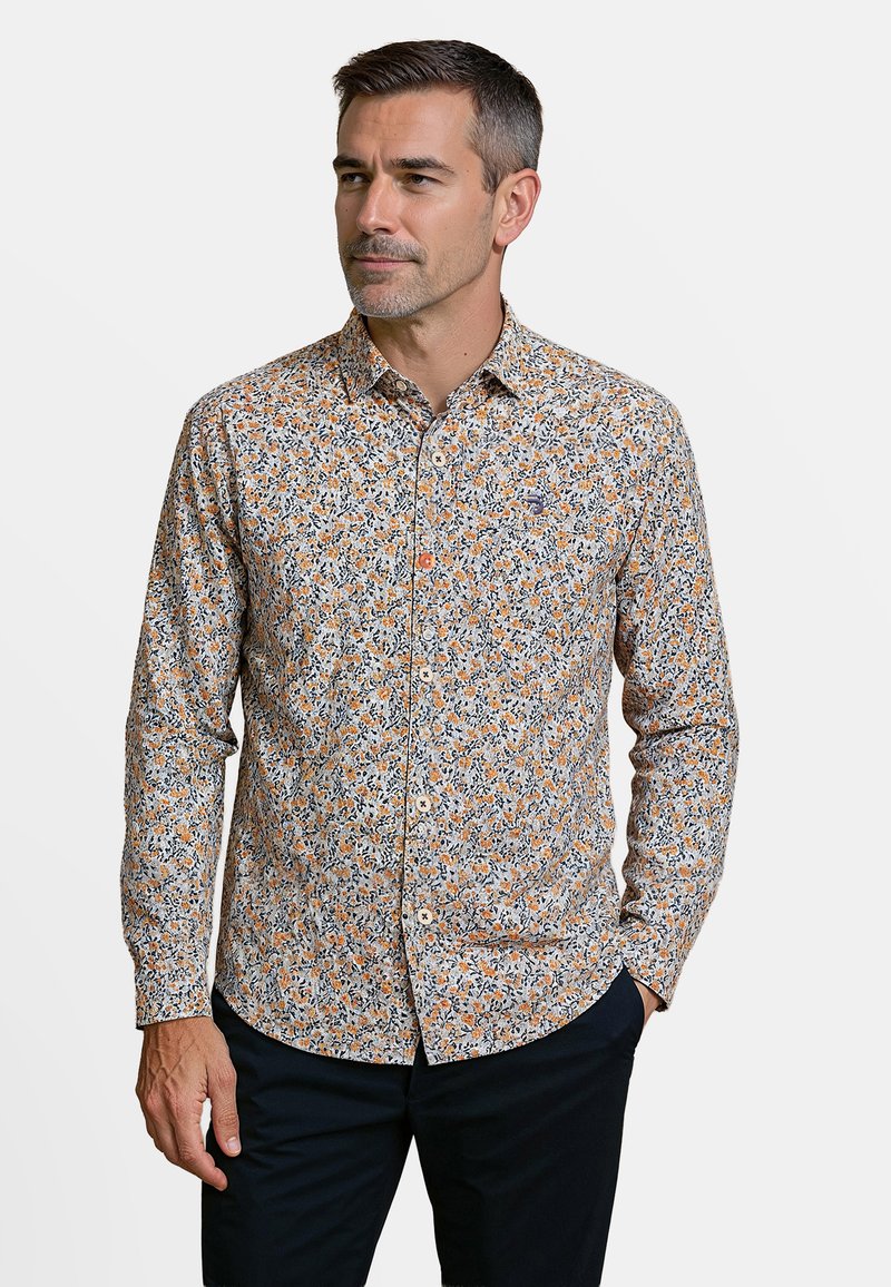 Bloemmotief overhemd met knopen in lichte stof, met een patroon van oranje en blauwe bloemen op een lichte achtergrond, voorzien van een puntig kraag en lange mouwen.