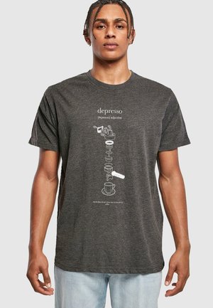 Dark grey t-shirt made of soft fabric. Features white graphic text and illustrations related to coffee brewing. Crew neck and short sleeves.