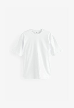 tricou alb din bumbac cu guler clasic, mâneci scurte și o croială lejeră. Textură netedă, fără modele sau accente vizibile.