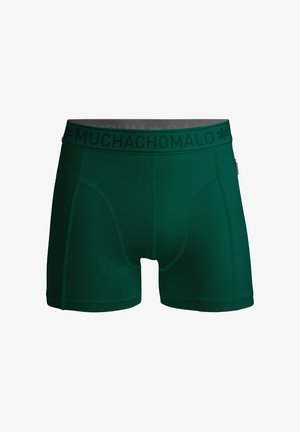 Zaļi bokseršorti, kas izgatavoti no mīksta, elastīga materiāla. Satur melnu jostu ar "MUCHACHOMALO" logo un nostiprinātu šuvi.