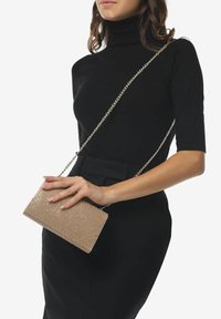 Miriade BRIGHTSHINE - Clutch - oro