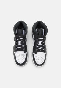 Jordan AIR JORDAN 1 MID SE UNISEX czarny