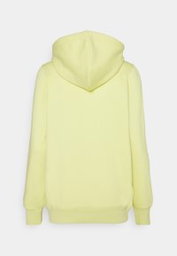 Sweat à capuche jaune clair vu de dos avec manches longues, capuche attachée, et poignets et ourlet côtelés.