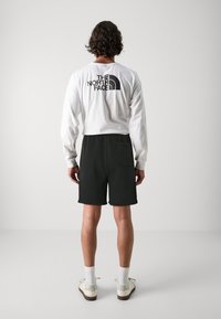 Abercrombie & Fitch JOCK TAG RELAXED - Shorts - black beauty acid wash