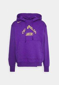 Sweat à capuche violet avec poche avant, texte jaune "Los Angeles Lakers" et logo Nike sur la poitrine.