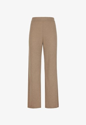 Breda byxor i ett mjukt, ljust brunt tyg. Har resårmidja och minimalistisk design utan synliga fickor eller mönster.