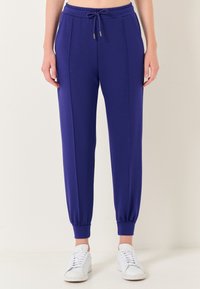 HIGH WAIST JOGGER - Trainingsbroek - purple