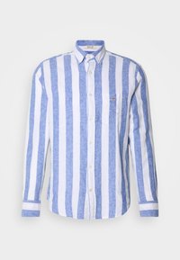 Overhemd met knopen en verticale blauw-witte strepen, gemaakt van lichtgewicht stof met een gestructureerde afwerking. Inclusief een borstzak.