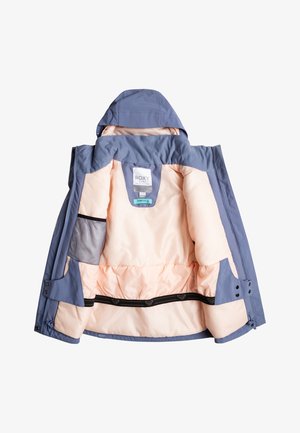 Veste pour fille Roxy avec un extérieur bleu et un intérieur rose clair. Comprend une capuche, des poches intérieures et un bandeau élastique noir au bas.