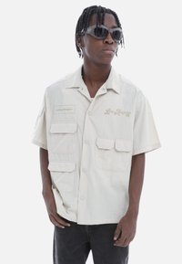 Unselected, beige