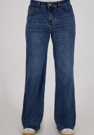 Wijd-uitlopende, blauwe denim jeans met een licht vervaagde afwerking, voorzien van voorkruiden en een knoopsluiting op de taille.