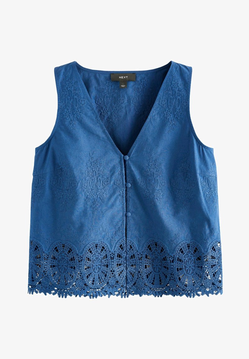 Blue sleeveless vest with V-neck, fabric-covered buttons down front, floral embroidery, and scalloped lace hem detailing.