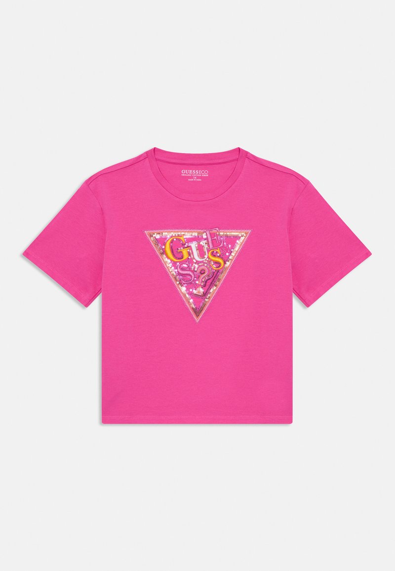 Tricou din bumbac roz, cu un grafic triunghiular care prezintă text colorat și accente strălucitoare. Guler rotund și mâneci scurte.
