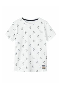 Hvid bomulds t-shirt med korte ærmer, prydet med et mønster af små blå hundeillustrationer og et mærke på den nederste side.