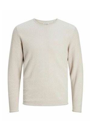 Lichtbeige langemouwtrui met een gestructureerd, wafelpatroon. Heeft een ronde halslijn en geribbelde manchetten bij de mouwen en onderkant.