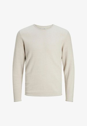 Helebeige pika varrukatega sviiter, millel on tekstureeritud vahvlikootud disain. Omab ümmargust kaelust ja ribakujulisi mansette varrukaotsades ning allääril.