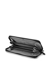 Black zip-around wallet with multiple compartments and card slots. Interior features a zigzag pattern and smooth gray lining.