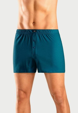 Teal boxers made of soft fabric, featuring an elastic waistband and two buttons in the front. Smooth texture with a fitted design.