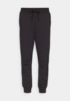 ICONS CUFF PANTS LARGE LOGO - Pantaloni sportivi - black