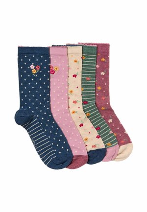 Fünf Paare bunter, gemusterter Socken mit Blumen- und Tupfendesigns, nebeneinander auf weißem Hintergrund angeordnet.
