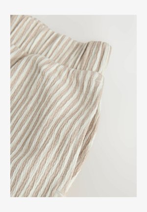 Tessuto leggero e a coste a righe beige e bianche, caratterizzato da una texture morbida e una cintura elastica per il massimo comfort.