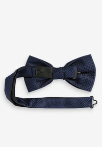 Papillon blu navy realizzato in tessuto testurizzato con una fascia liscia, simile alla seta. Presenta un sistema di chiusura a strappo per una vestibilità sicura.