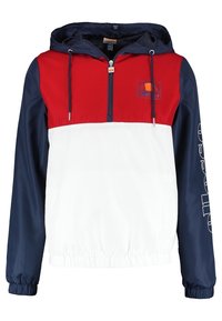 Röd, vit och marinblå vindjacka med luva, dragkedja framtill, elastisk nederkant och med en logotyp på bröstet samt text längs ärmen.