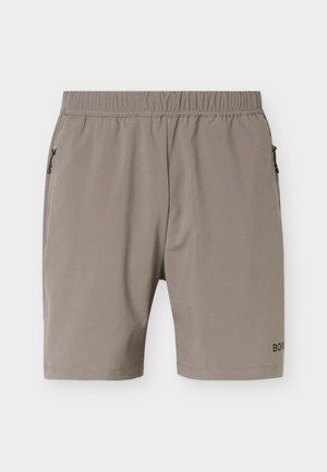 Lichtbruine herenshorts met elastische tailleband, twee zijzakken met rits en een klein logo bij de zoom op het rechterbeen.