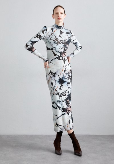Long-sleeve, form-fitting dress with marble pattern in light and dark tones, featuring a high neckline and a midi length. Fabric has a smooth texture.