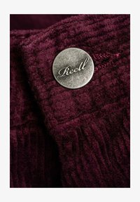 Unselected, burgundy cord