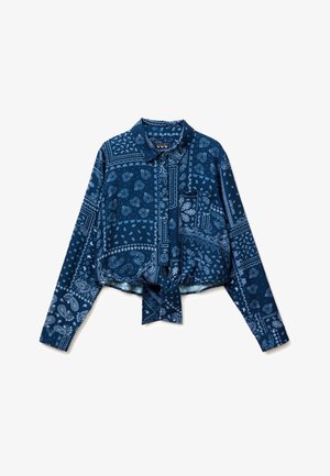 Chemisier court bleu marine à manches longues avec imprimé bandana paisley, patte de boutonnage devant, col, poche poitrine unique et détail noué à l'avant.