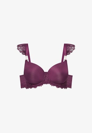 Fioletowy stanik z gładkimi, formowanymi miseczkami, koronkowymi detalami na ramiączkach i obwodzie oraz delikatnym falbaniem. Zawiera metalowe akcenty.