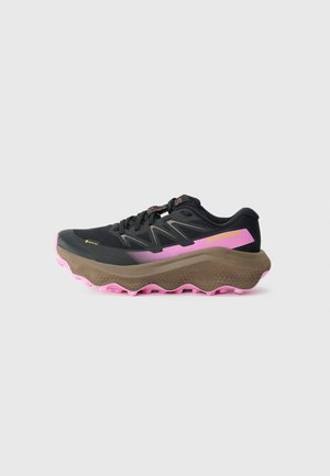 Black athletic shoe with a mesh upper, features pink and brown accents, textured sole, and a pronounced heel for cushioning and grip.