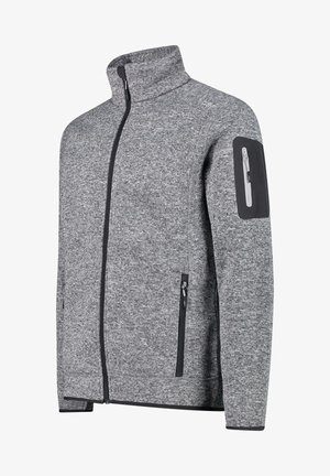 Veste grise pour homme avec fermeture éclair complète, col montant, tissu texturé, poches zippées avec bordure noire et poche zippée sur la manche gauche supérieure.