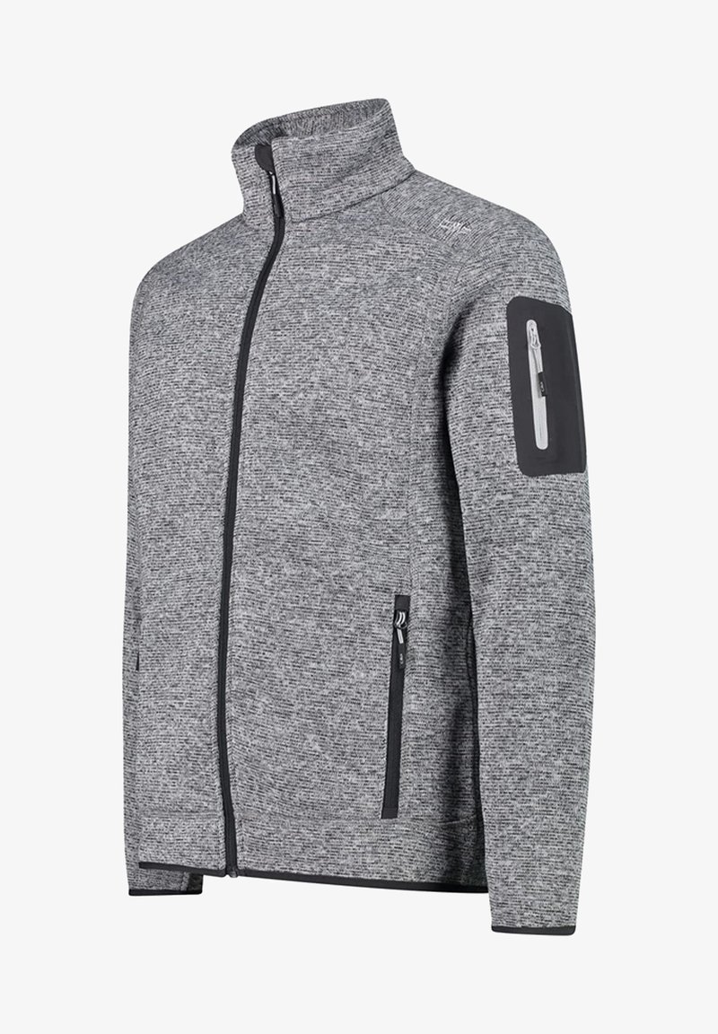 Veste grise pour homme avec fermeture éclair complète, col montant, tissu texturé, poches zippées avec bordure noire et poche zippée sur la manche gauche supérieure.