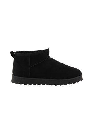 Black ankle-high winter boot with soft suede upper, pull tab at heel, and thick ridged sole for traction, shown in side profile.