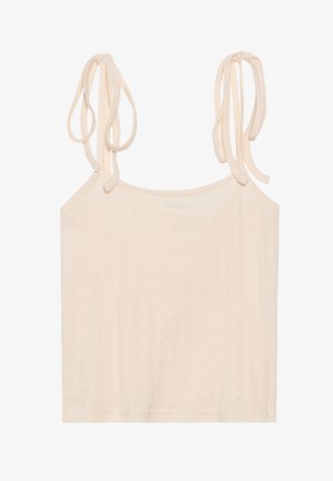 Camisola beige chiaro con spalline regolabili e annodate, realizzata in un tessuto texture con sottili righe verticali e piccoli motivi decorativi.