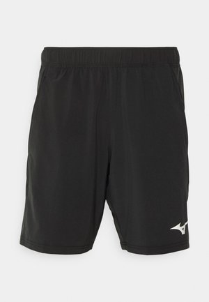 Shorts de sport noirs avec une taille élastique, fabriqués en matériau léger, présentant un petit logo blanc en bas à droite.