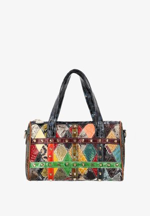 Colorful patchwork leather handbag with diamond patterns, studded horizontal straps, and two black handles against a white background.