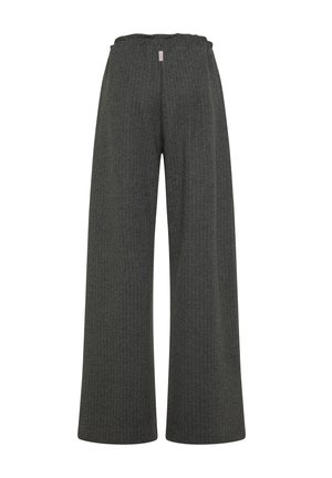 Brede pijpen gemaakt van ribbed donkergrijs stof, met een elastische tailleband en een label op de achterkant voor branding.