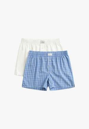 Due paia di boxer da uomo, uno bianco semplice e uno blu con motivo a quadretti bianchi, entrambi con elastico in vita e patta con bottoni.