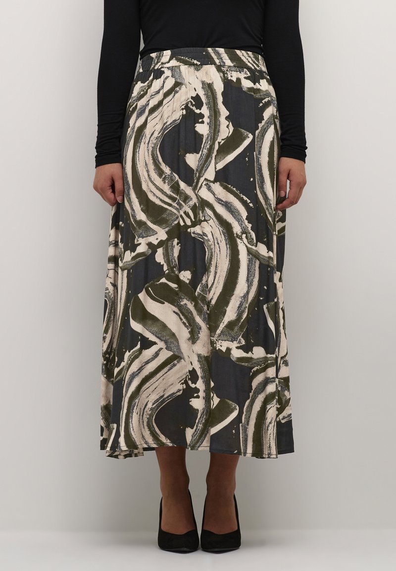 Jupe longue et fluide avec une base sombre et des motifs abstraits crème et olive. Confectionnée en tissu doux, elle possède une taille élastique et un design plissé.