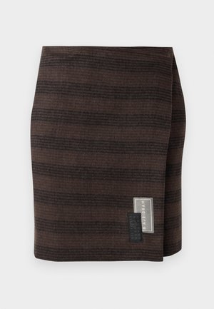 Brown skirt made from textured fabric, featuring horizontal stripes in varying shades. Tag on the side displays brand name and care instructions.