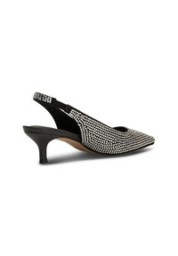 Schwarze Slingback-Absätze mit spitzem Zehenbereich, verziert mit silbernen Strasssteinen entlang des Obermaterials für Textur und Glanz. Design mit niedrigem Absatz.