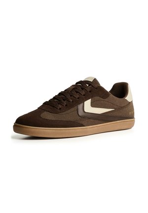 Brown suede and fabric low-top sneaker with beige accents, gum sole, lace-up closure, and minimalist design on white background.