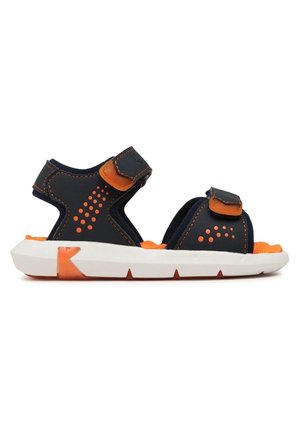 Sandale pour enfants noire et orange à bout ouvert avec des sangles ajustables et une semelle blanche coussinée, présentant des motifs de points orange sur les côtés.