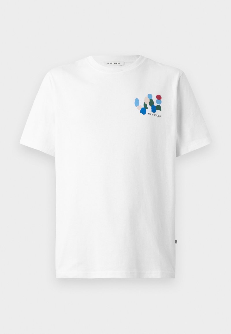 White cotton t-shirt featuring a colorful abstract design on the left chest with blue, green, red, and peach shapes. Short sleeves and a round neck.